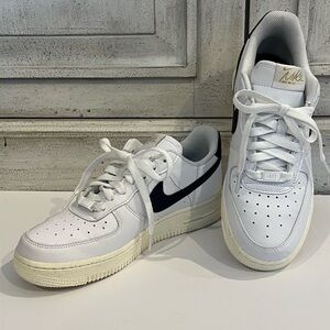 Women’s Nike Air Force One White and Navy Sneakers